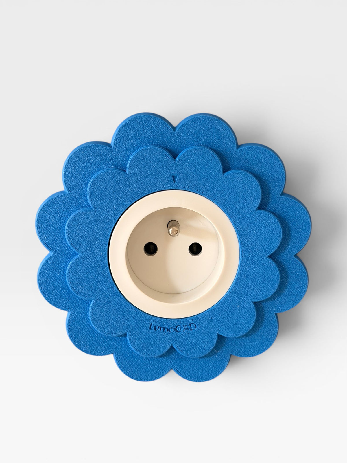 Cache prise Floa Bleu cobalt LumoCAD