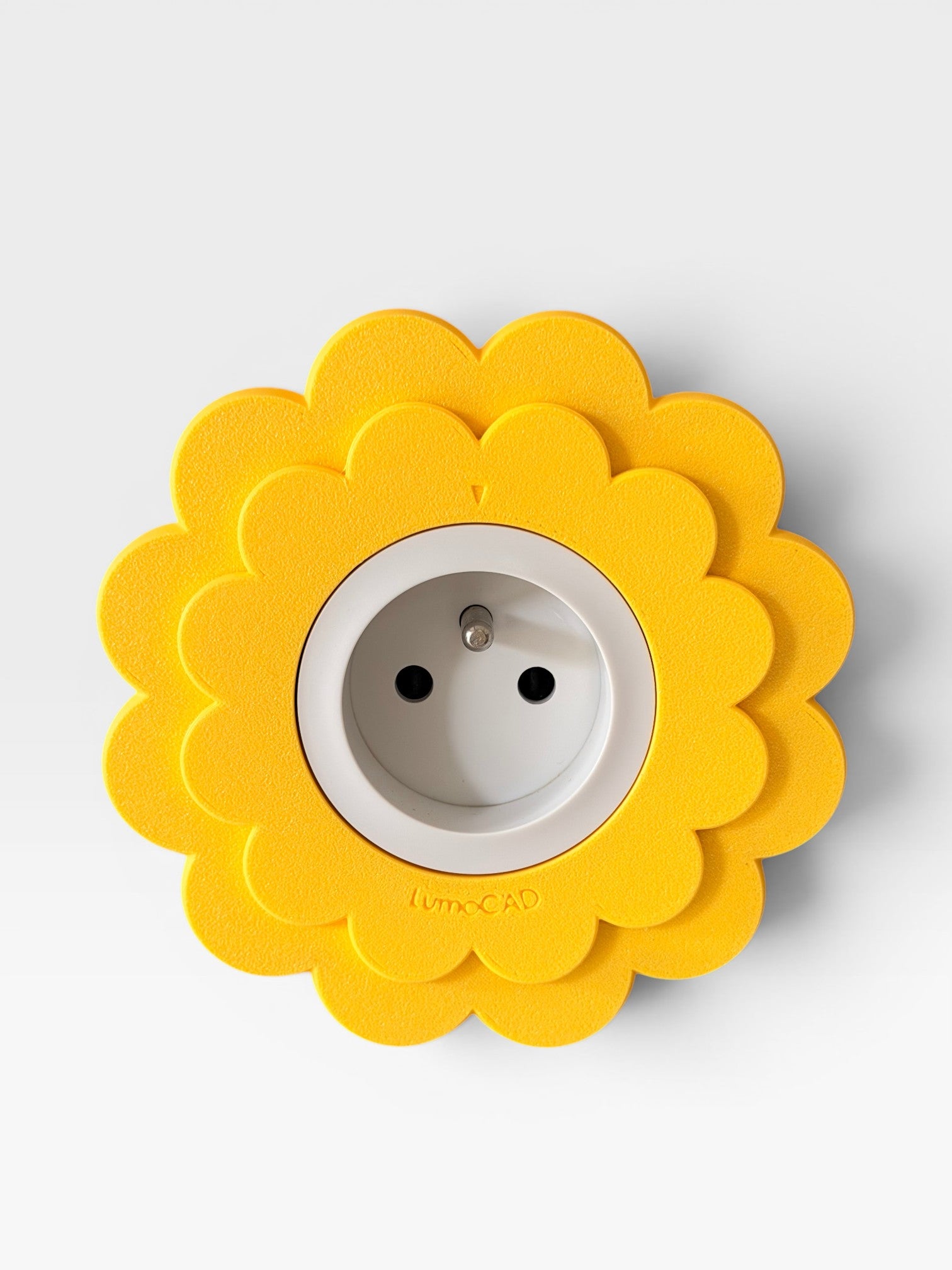 Cache prise Floa Jaune pastel LumoCAD
